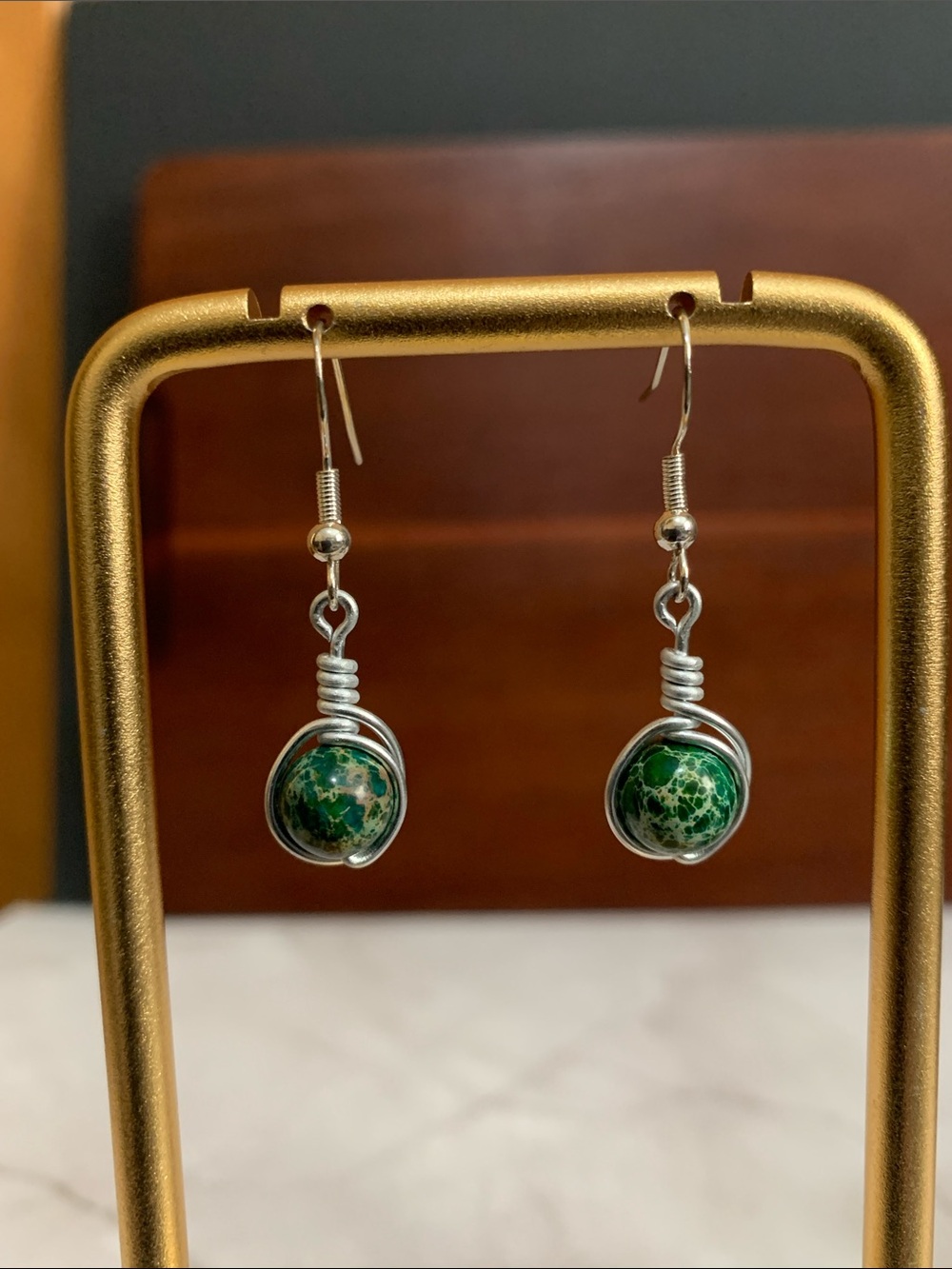 Handmade wire wrapped green sea sediment jasper bead earrings
